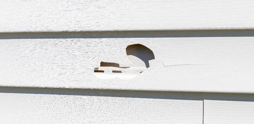 Hail damage on siding for houses in Iowa