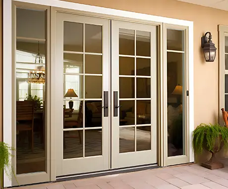 A spacious double door with transparent glass panels on its exterior surface.