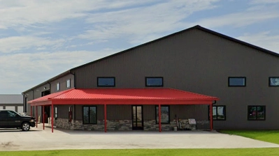 Large building with red awning.